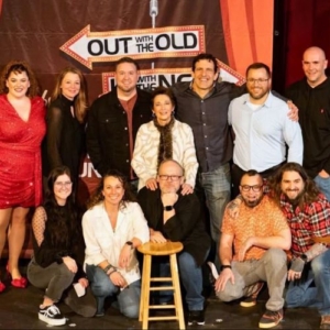 A group of people gathered on stage